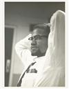 MALCOLM X. SCHATT, ROY. Group of five gelatin silver prints of Malcolm X, taken while on the ""Long John Nebel"" radio program.